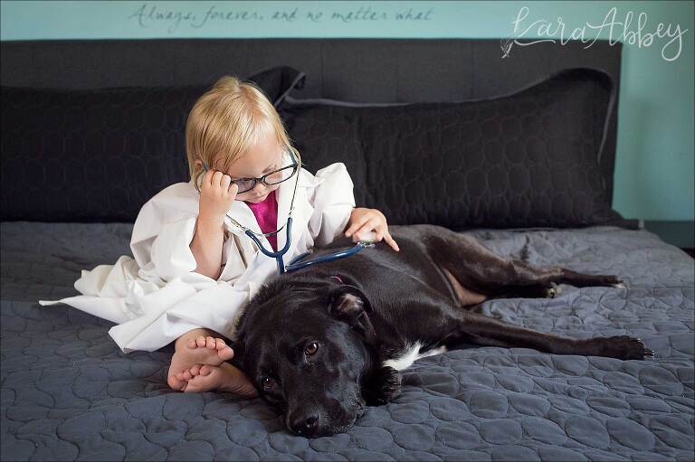Toddler Plays Doctor with Sick Black Lab in Irwin, PA