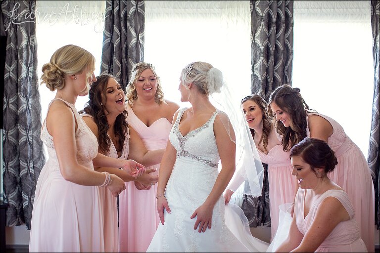 Bride & her bridesmaids getting ready for wedding day