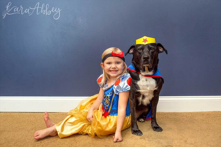 Black Lab And Toddler Dressed up for Halloween: Snow White & The Prince