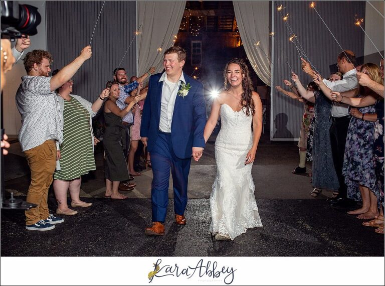 Navy and Pink Summer Outdoor Wedding at the Hayloft in Rockwood, PA Reception Formal Sparkler Exit