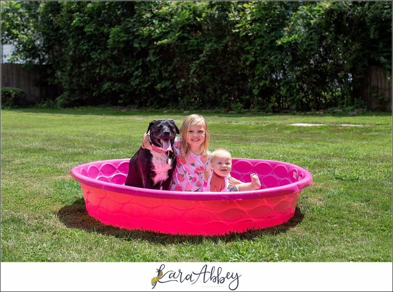 Abby's Saturday Black Lab Toddler and Baby in a Kiddie Pool in Irwin PA