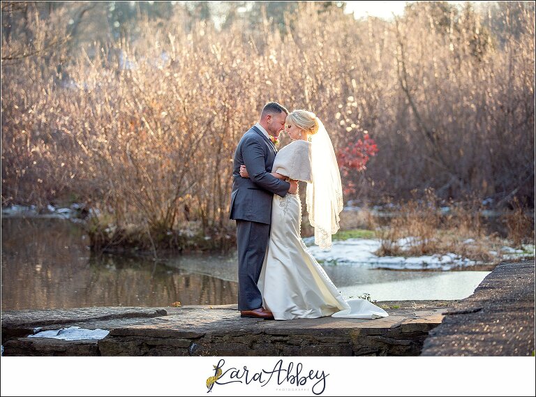 Purple & Grey Fall Wedding Pictures at Green Gables Jennerstown PA - Bride & Groom Newlywed Portraits at Golden Hour on the Dam with the Waterfall