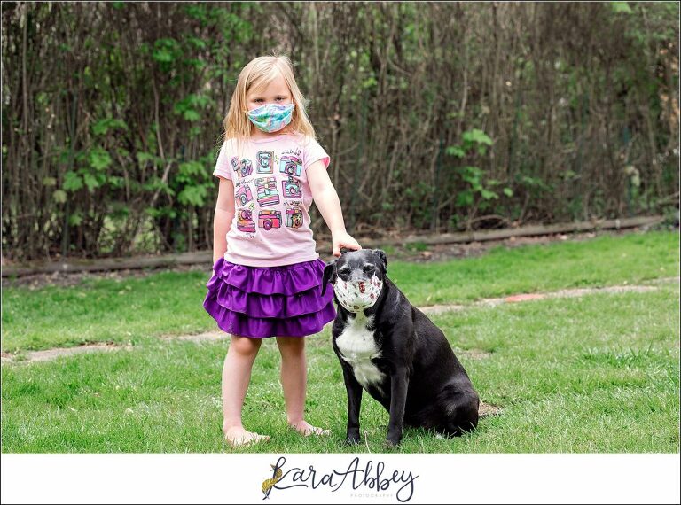 Black Lab and Little Girl Wearing Masks in Irwin PA
