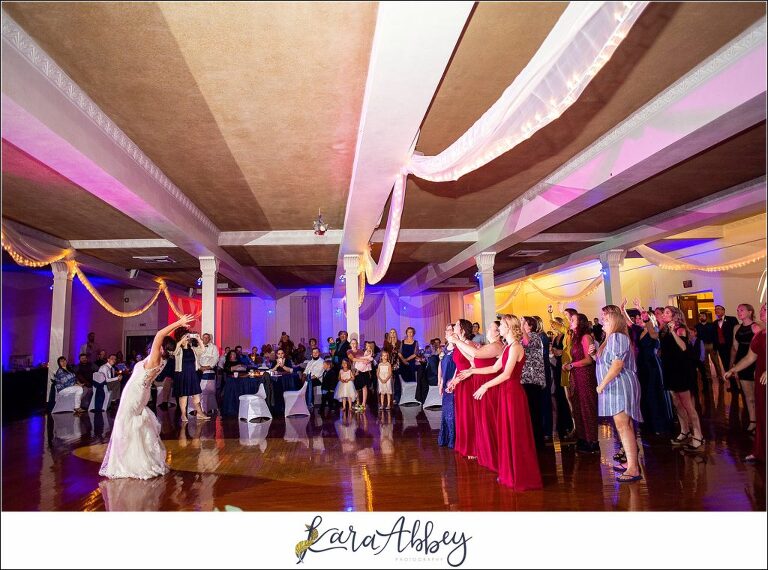 Burgundy & Navy Fall Wedding in Johnstown, PA - Reception at The Johnstown Masonic Temple Bouquet Toss