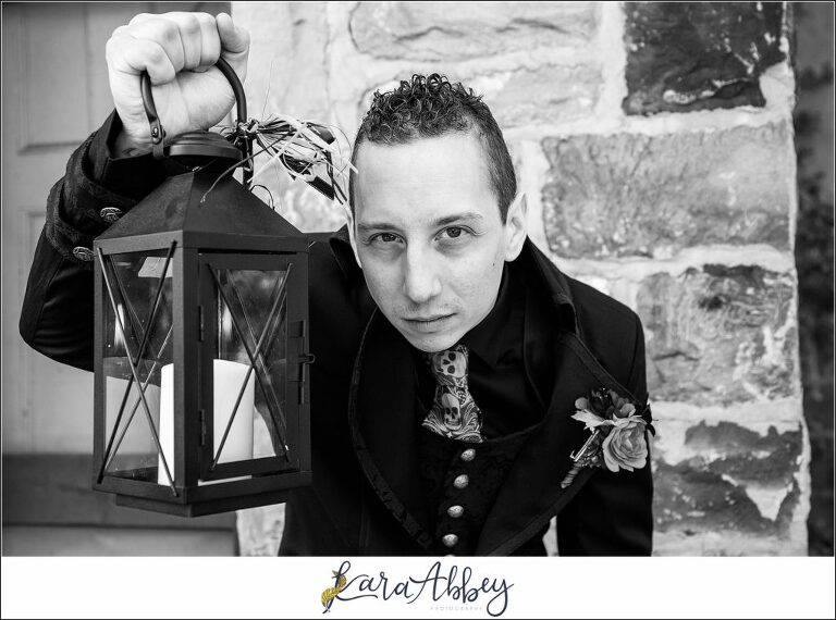 Black and Purple Disney Halloween Themed Fall Wedding at Green Gables in Jennerstown PA - Groom Portrait with Lantern