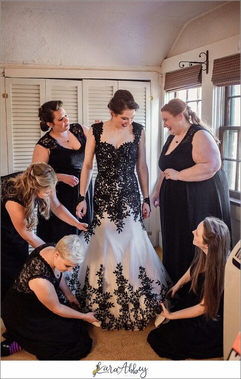 Black and Purple Disney Halloween Themed Fall Wedding at Green Gables in Jennerstown PA - Bride Getting Ready with Bridesmaids