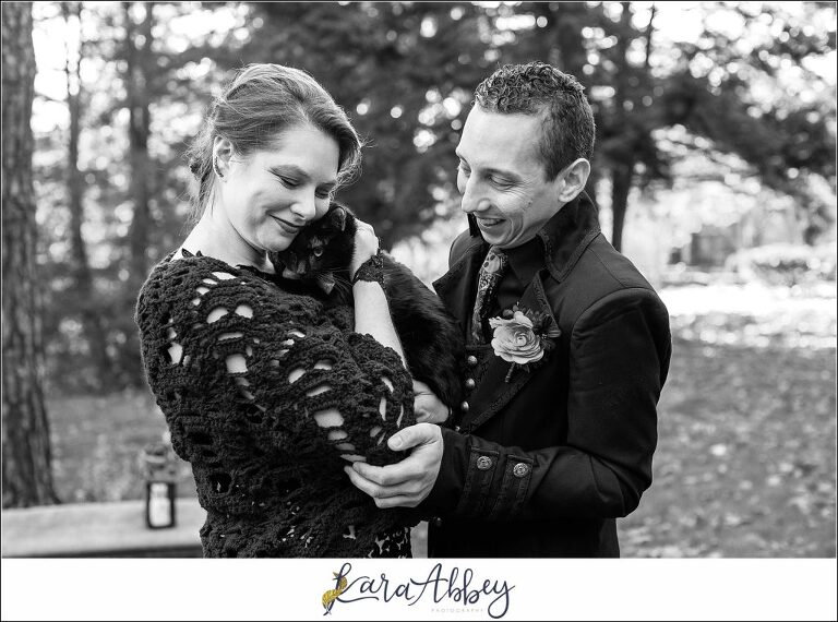 Black and Purple Disney Halloween Themed Fall Wedding at Green Gables in Jennerstown PA - Bride & Groom with their Black Cat