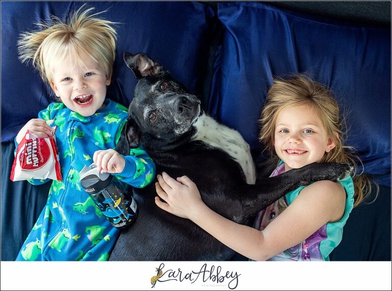 Abbys Saturday Black Lab and Kids Laying Together in Irwin PA