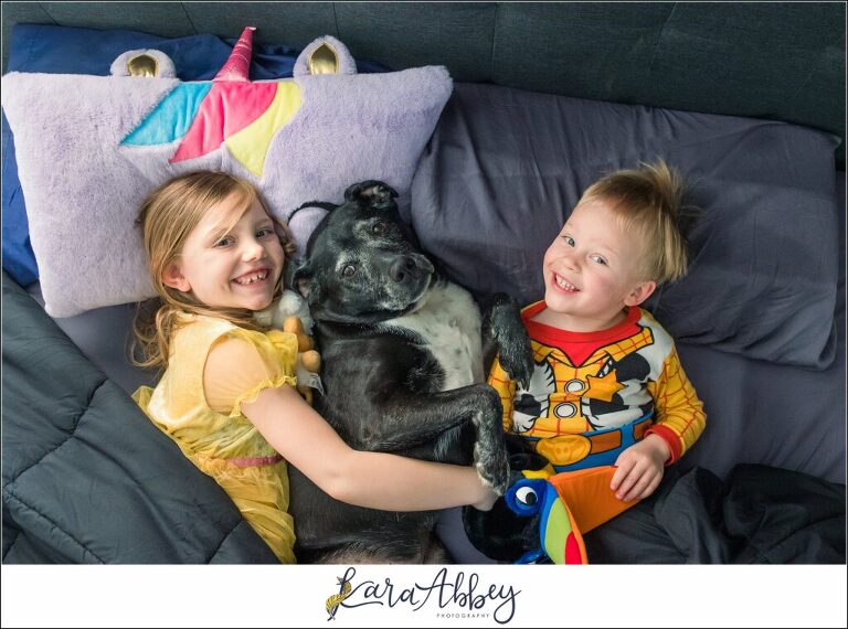 Abbys Saturday Kids and Black Lab Laying in Bed in Irwin PA